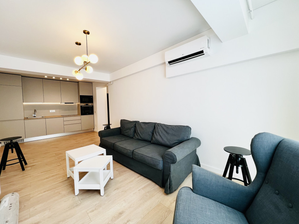 Apartament elegant amenajat, totul nou cu parcare si centrala proprie