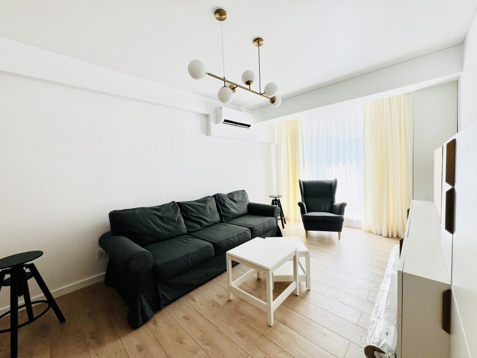 Apartament elegant amenajat, totul nou cu parcare si centrala proprie