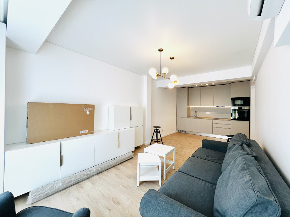 Apartament elegant amenajat, totul nou cu parcare si centrala proprie