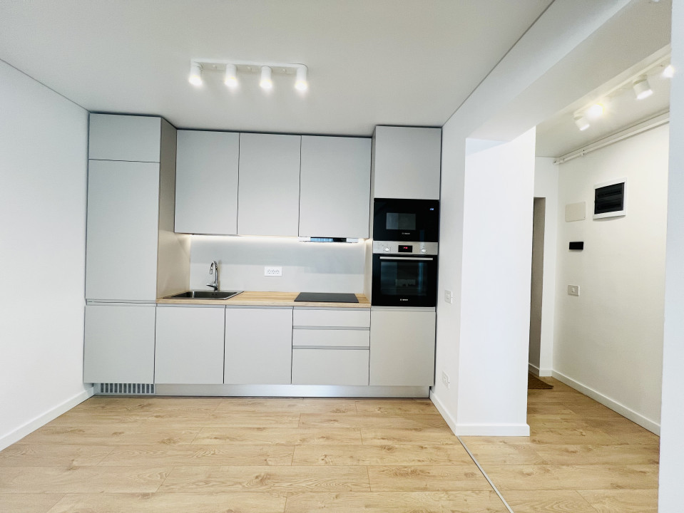 Apartament elegant amenajat, totul nou cu parcare si centrala proprie