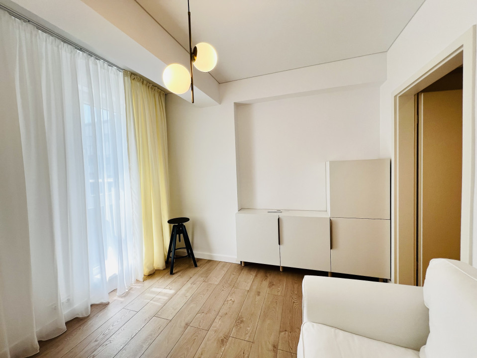 Apartament elegant amenajat, totul nou cu parcare si centrala proprie