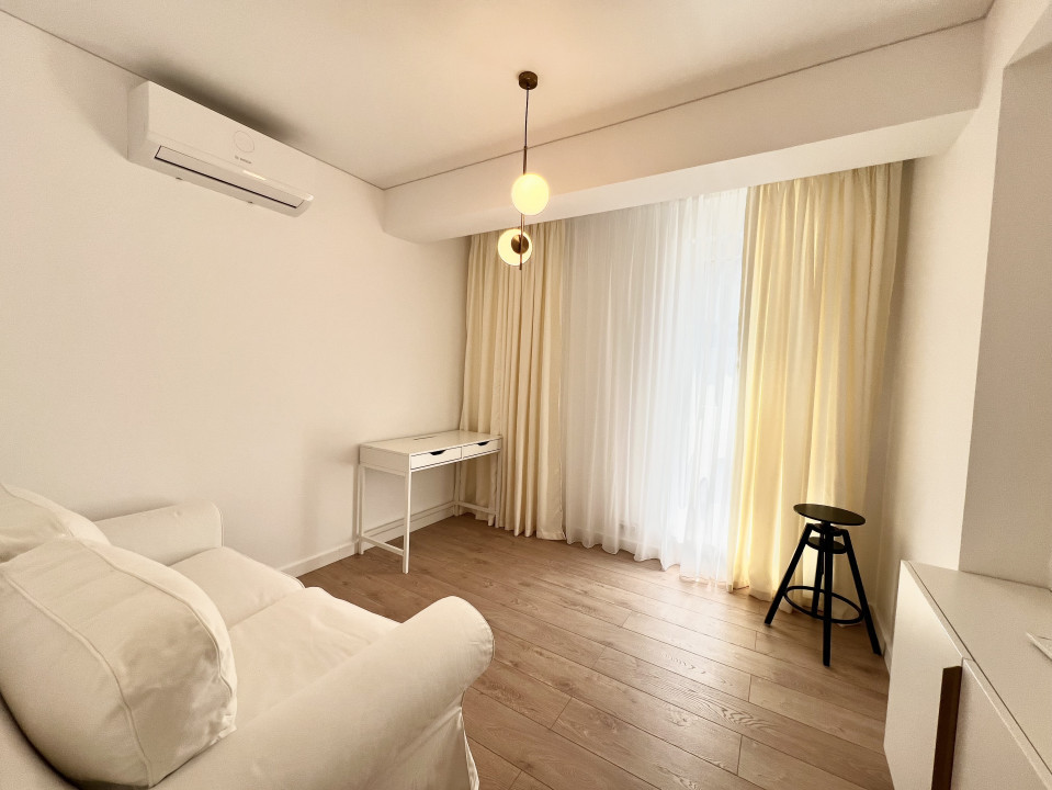 Apartament elegant amenajat, totul nou cu parcare si centrala proprie