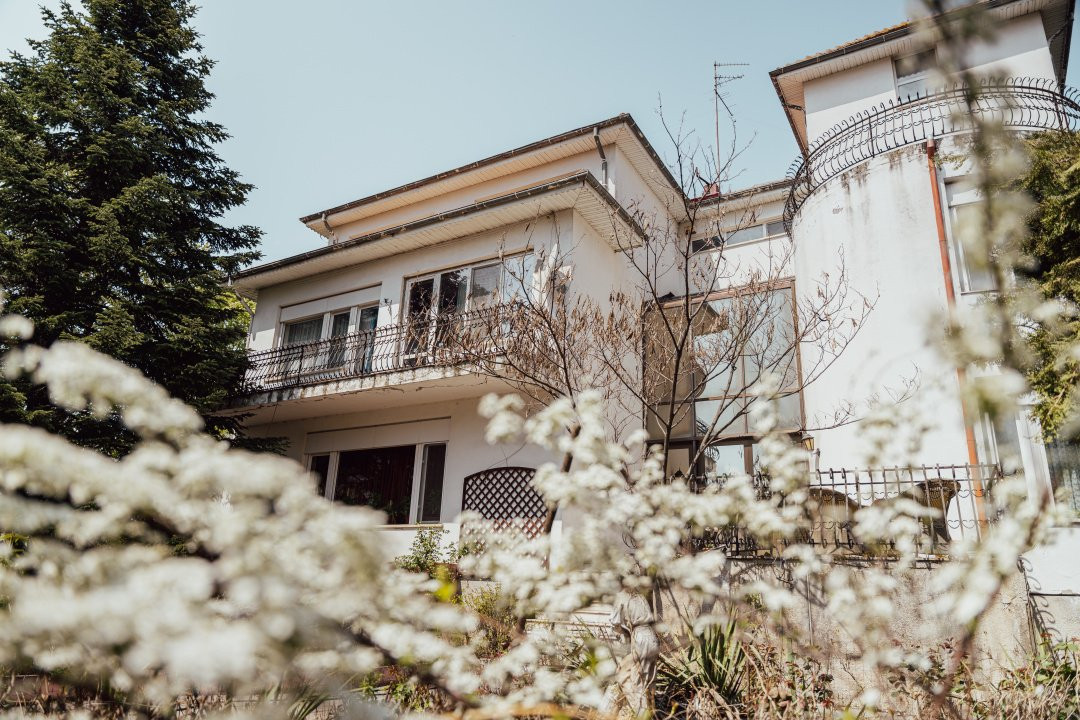 Casă individuală cu arhitectură deosebită și potențial investițional