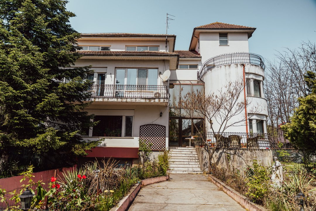 Casă individuală cu arhitectură deosebită și potențial investițional