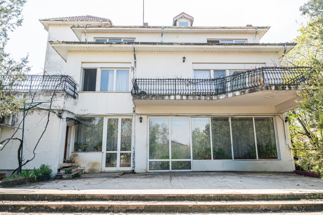 Casă individuală cu arhitectură deosebită și potențial investițional