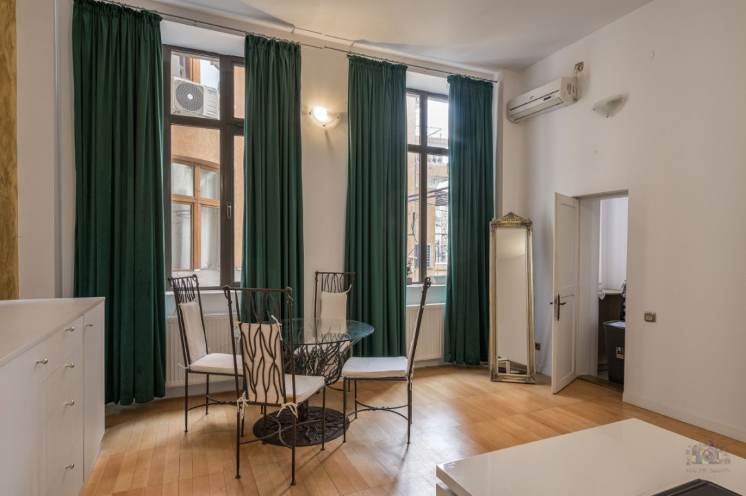 Business cu identitate: Apartament Unirii , demisol, parter si curte accesibila