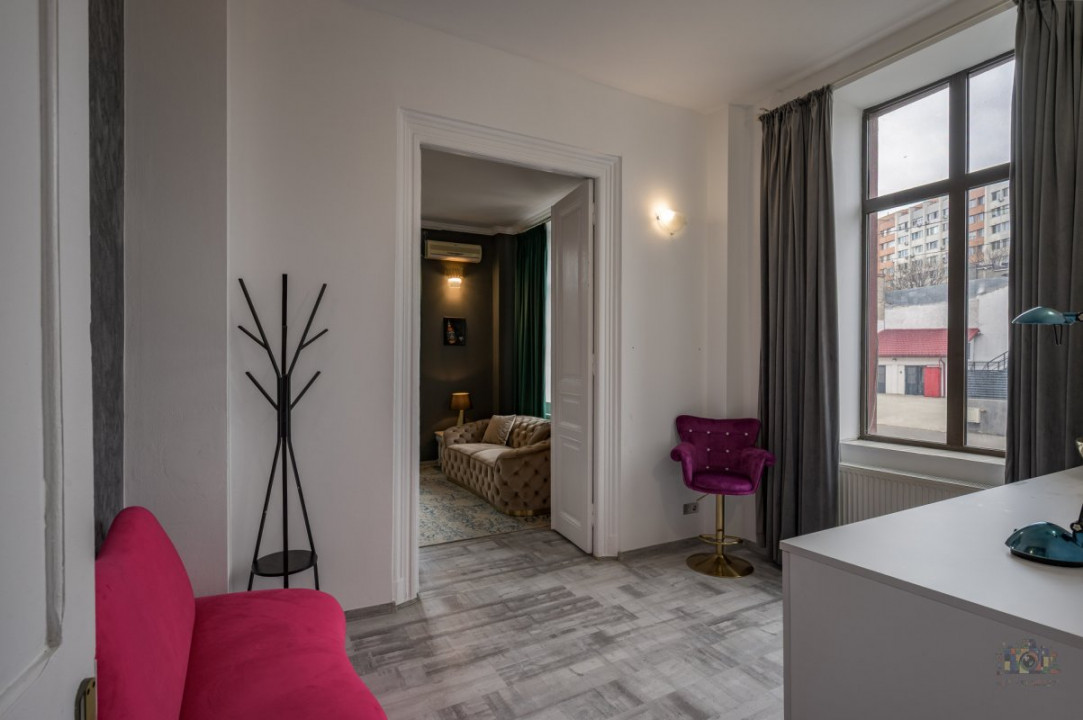 Business cu identitate: Apartament Unirii , demisol, parter si curte accesibila