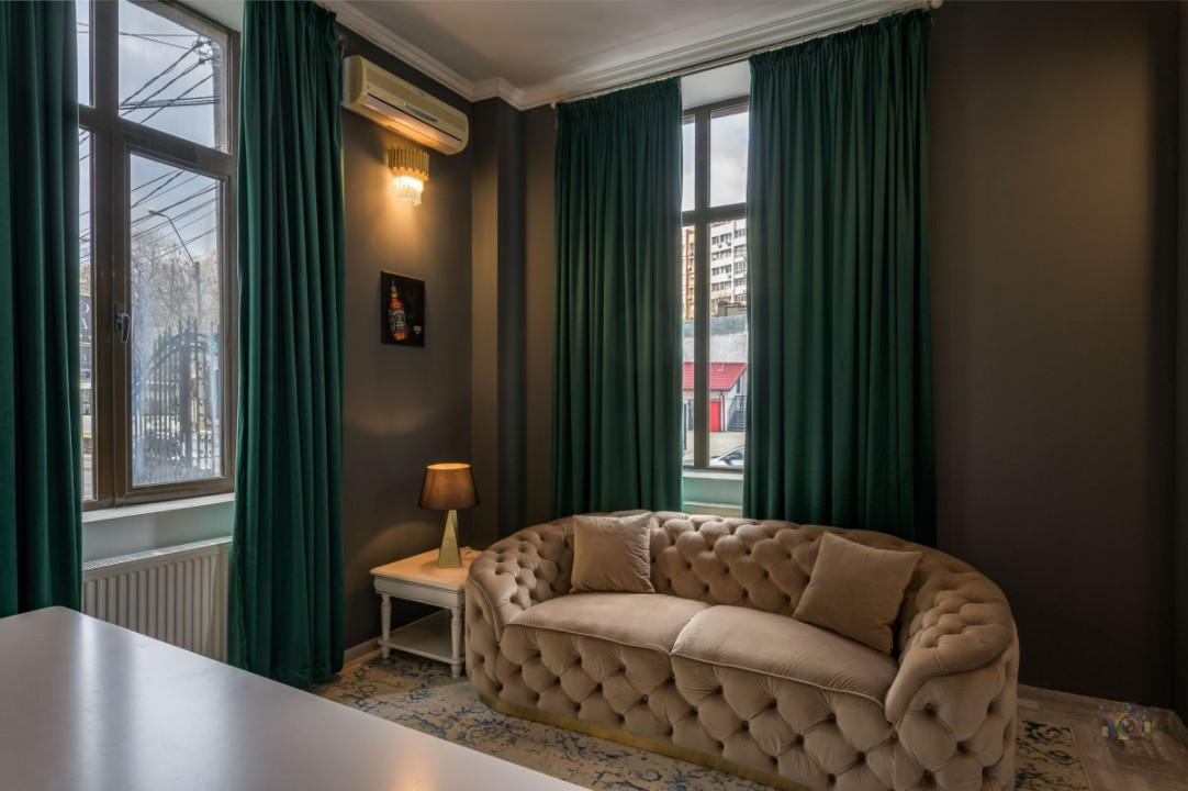 Business cu identitate: Apartament Unirii , demisol, parter si curte accesibila