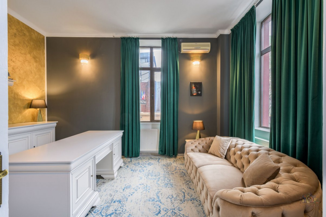 Business cu identitate: Apartament Unirii , demisol, parter si curte accesibila