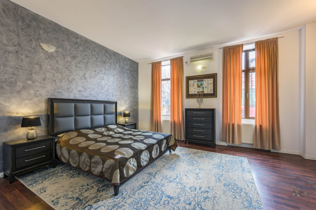 Business cu identitate: Apartament Unirii , demisol, parter si curte accesibila