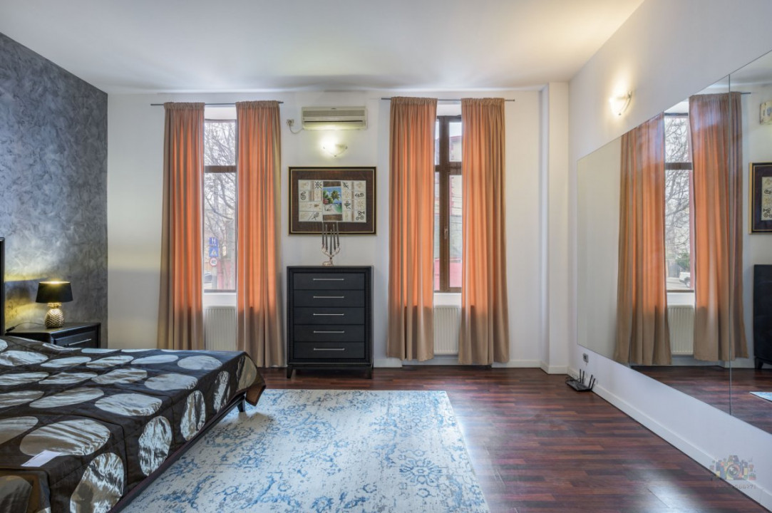 Business cu identitate: Apartament Unirii , demisol, parter si curte accesibila