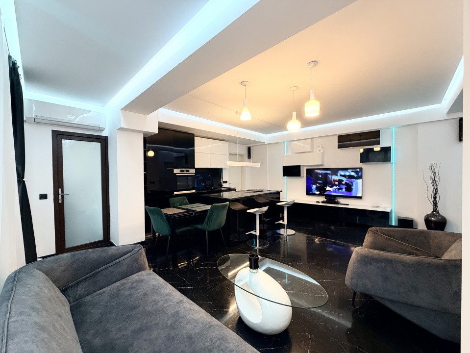 Apartament frumos amenajat de inchiriat cu centrala si parcare 