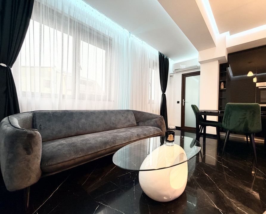 Apartament frumos amenajat de inchiriat cu centrala si parcare 