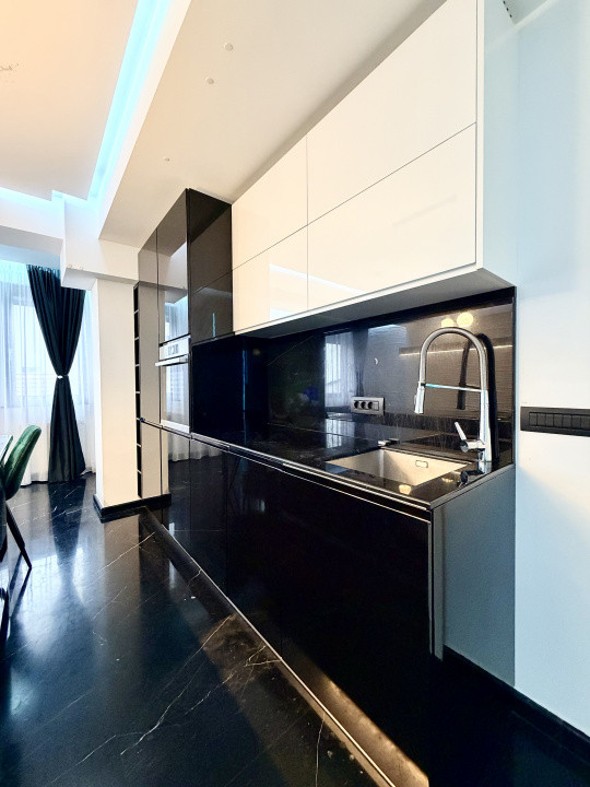 Apartament frumos amenajat de inchiriat cu centrala si parcare 
