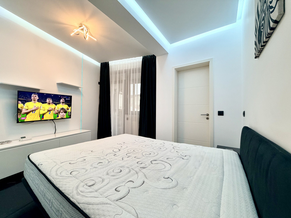 Apartament frumos amenajat de inchiriat cu centrala si parcare 