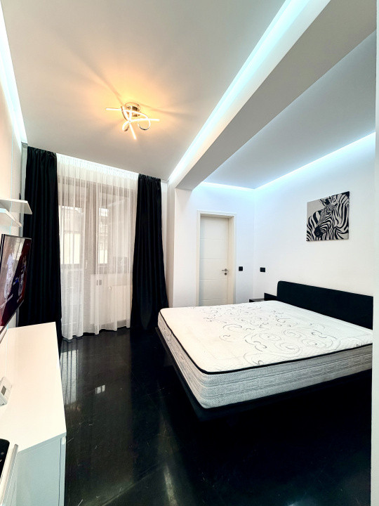 Apartament frumos amenajat de inchiriat cu centrala si parcare 