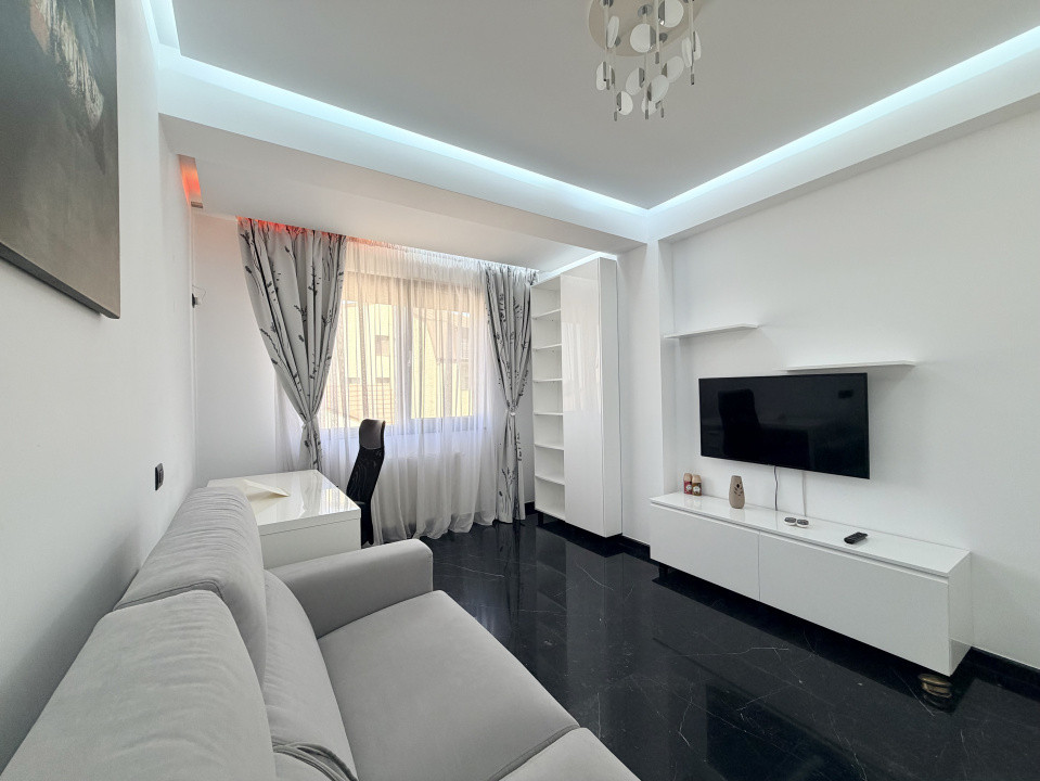 Apartament frumos amenajat de inchiriat cu centrala si parcare 