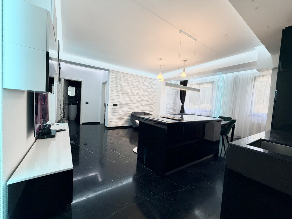 Apartament frumos amenajat de inchiriat cu centrala si parcare 