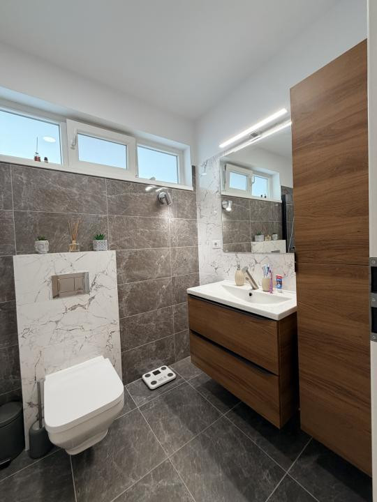 Apartament 3 camere + grădină + 2 locuri parcare 