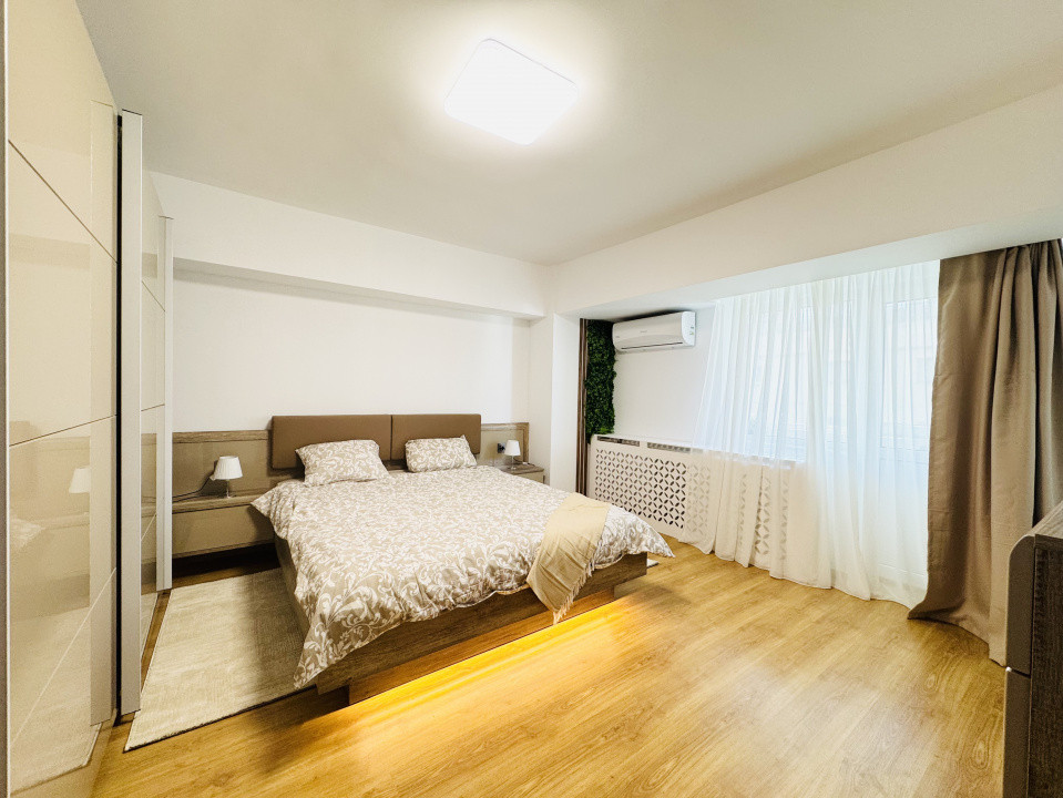 Apartament frumos amenajat cu  4 camere in Decebal-Metrou Muncii