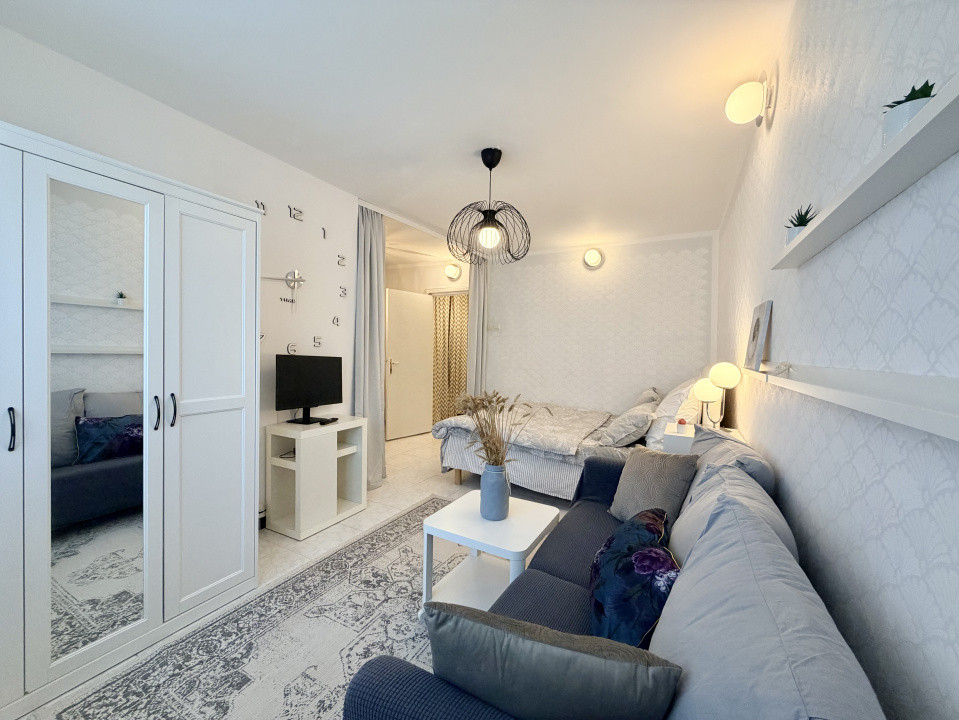 Cozy Studio luminos in Banu Manta - Victoriei cu pat si canapea