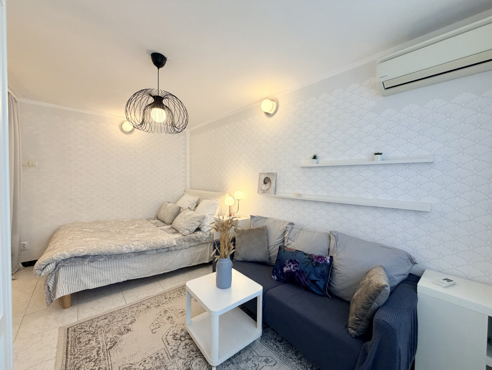 Cozy Studio luminos in Banu Manta - Victoriei cu pat si canapea