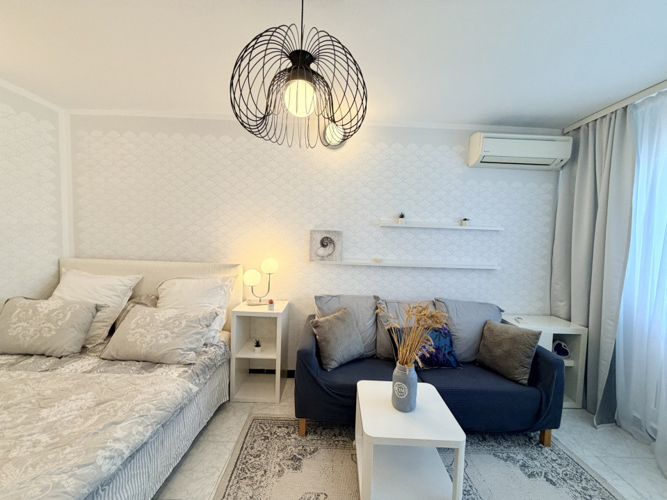 Cozy Studio luminos in Banu Manta - Victoriei cu pat si canapea