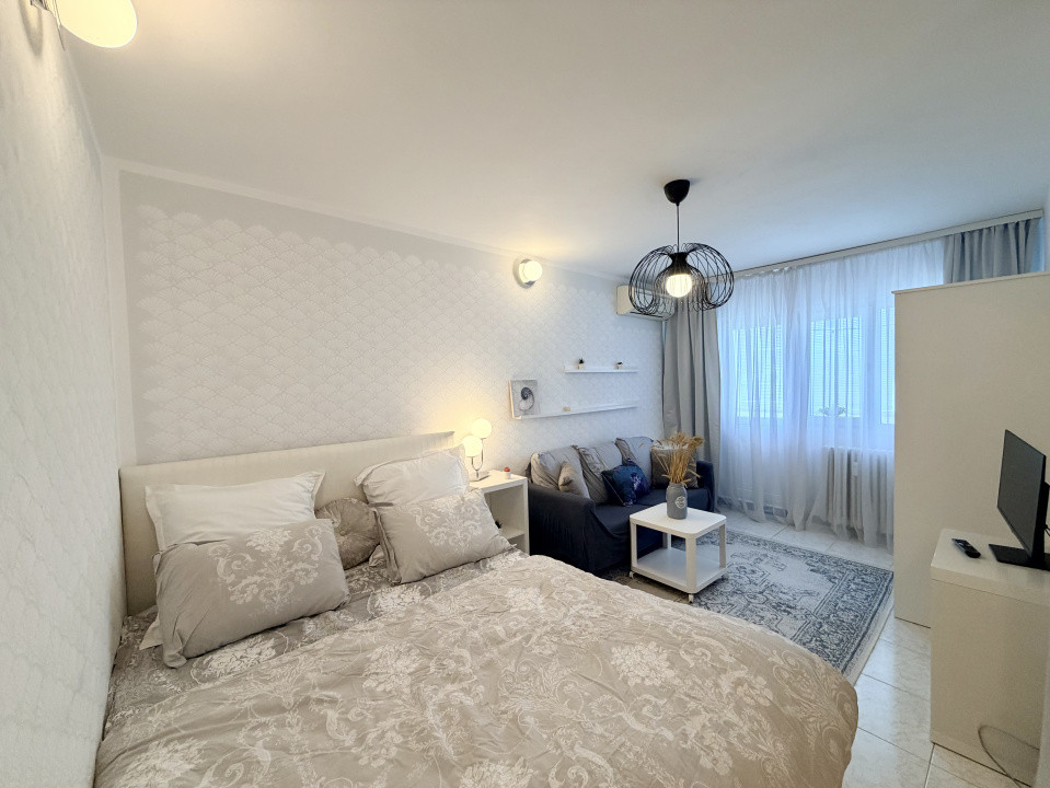 Cozy Studio luminos in Banu Manta - Victoriei cu pat si canapea